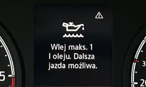 Kontrolka oleju świeci, komunikat "Wlej maks. 1 l oleju. Dalsza jazda możliwa." sugeruje, że można jeszcze przejechać, ale trzeba szybko dolać płynu.