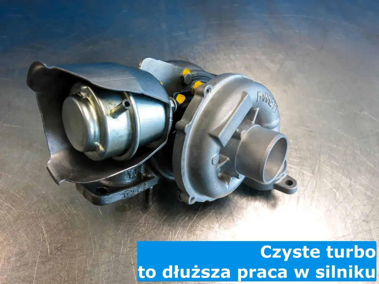 Nowa turbosprężarka Garrett na metalowym blacie. Pytanie: czy przy wymianie turbiny trzeba wymienić olej? Czyste turbo to dłuższa praca w silniku.